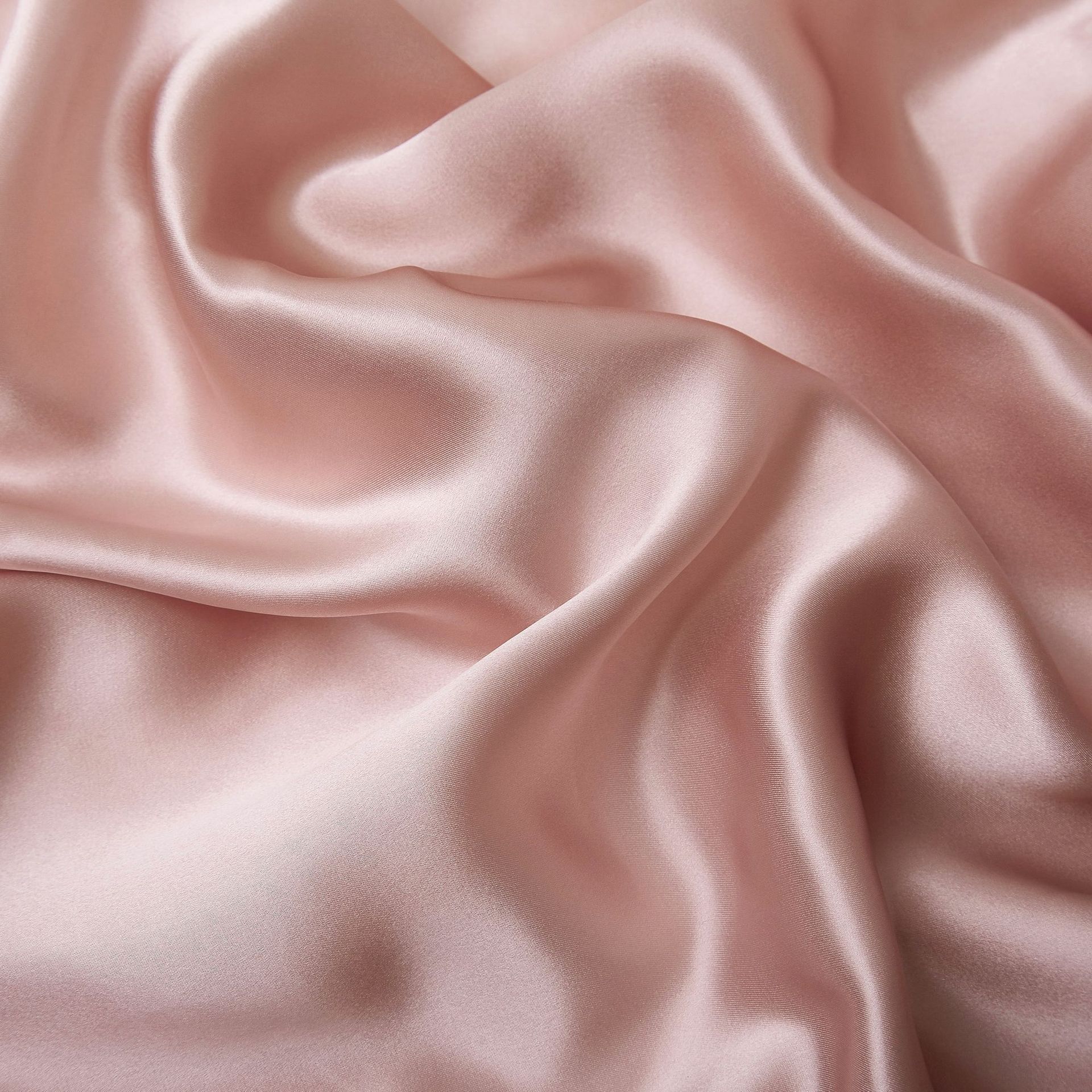 Detail of 100% pure mulberry silk texture on the front of the pillowcase.